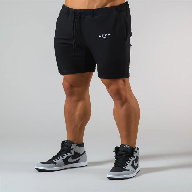 Slim athleisure shorts men running in the gym